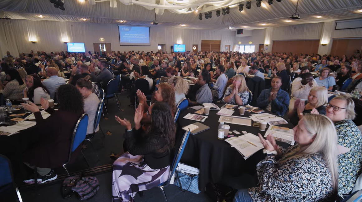 Conference audience of 500+ applauding Anna's keynote