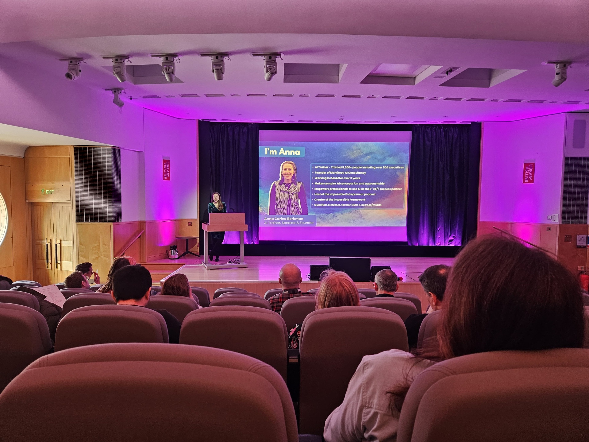 Anna Carina Berkman speaking on the British Library auditorium stage