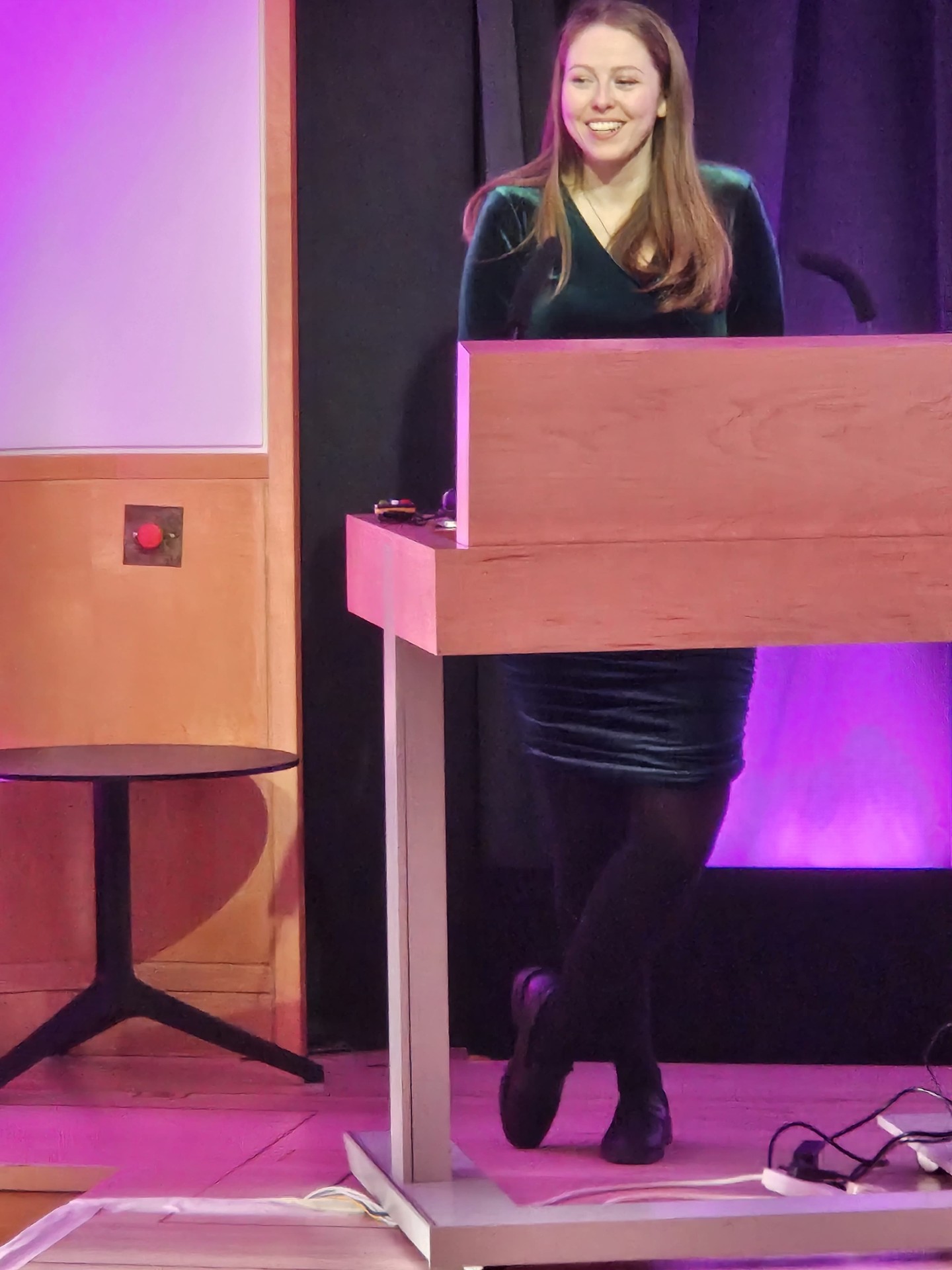 Anna smiling at the lectern, British Library